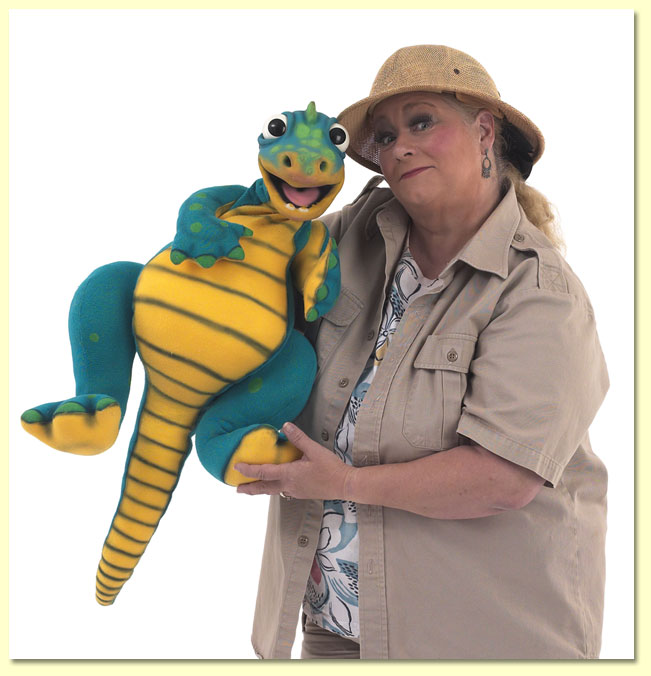 Big photo of ventriloquist Margaret Clauder as Paleo-Maggie with a dinosaur puppet.