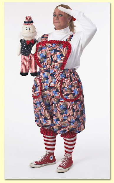 Picture of Margaret Clauder dressed as Patriotic Patty saluting with her Uncle Sam puppet.