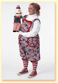 Photo of Margaret Clauder with Uncle Sam the hand puppet.