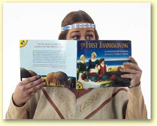 Photo of Singing Bird reading The First Thanksgiving.