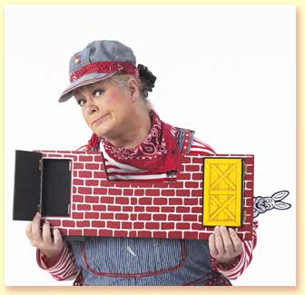 Photograph of Margaret Clauder as Engineer Maggie with a vanishing rabbit trick.