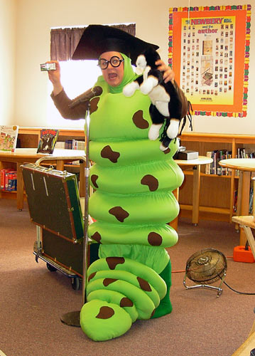 Photograph of Bookworm telling a story.