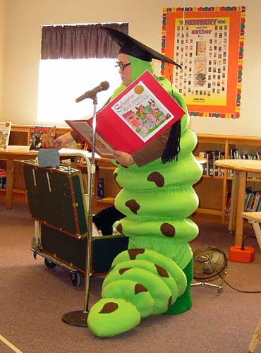 Picture of the Bookworm devouring a book.