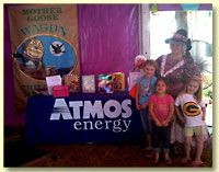 Photo of Margaret Clauder as Mother Goose at the Texas State Fair, 2010, sponsored by Atmos Energy.