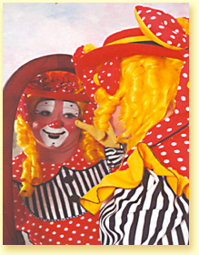Photo of Maggie the Clown in a mirror.